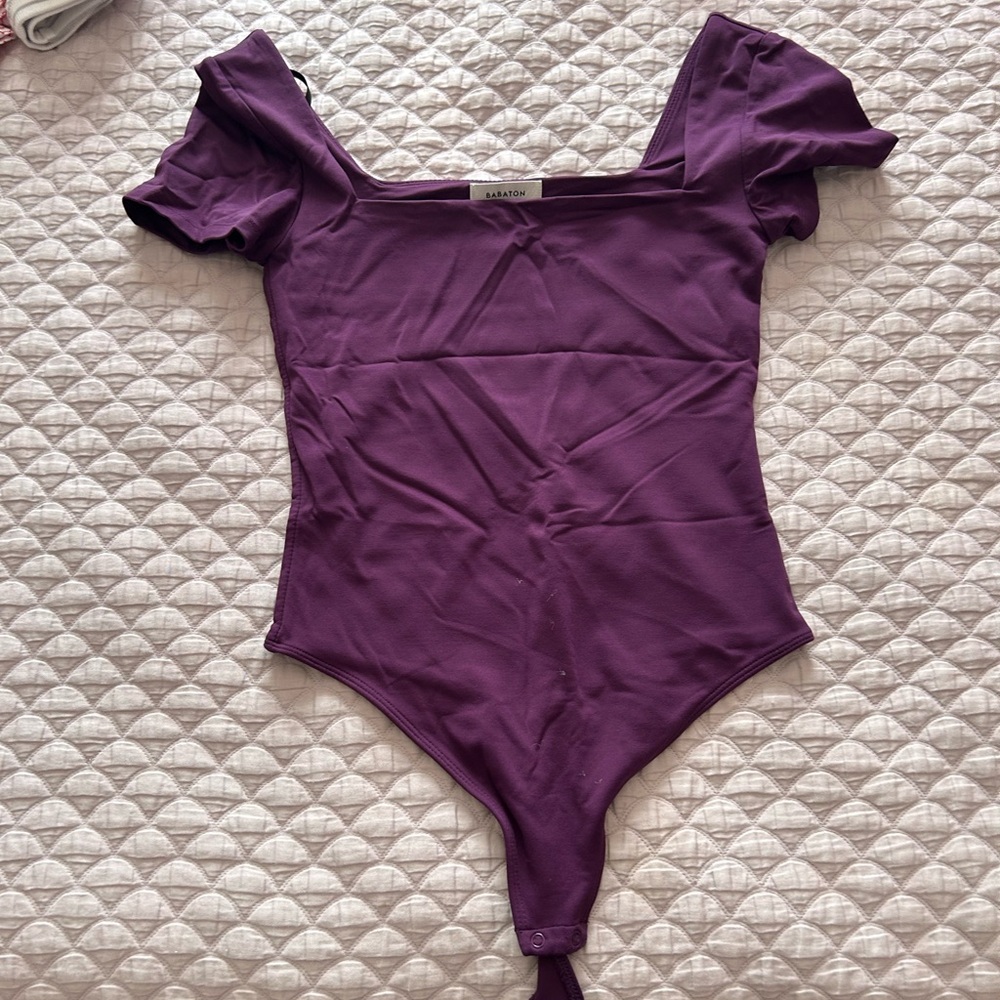 Gorgeous purple bodysuit. Size M, rarely worn
